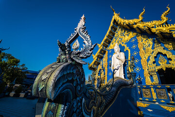 Chiang Rai, Thailand - January, 09, 2022 :  Thai traditional church is the art of Wat Rong Suea Ten at Chiangrai Thailand.