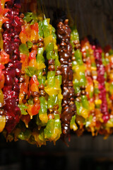 Churchkhela,  homemade traditional Georgian candy. Colorful treat made of nuts and juice.