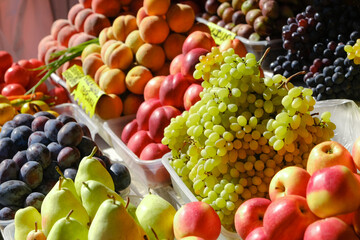Fruit market with various colorful fresh fruits and vegetables
