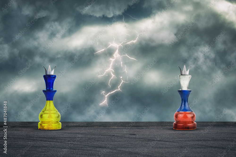 Wall mural Chess Queens in the colors of the Flag of Russia and Ukraine. Cloudy sky. Lightning. Conflict. Politics. Economy.