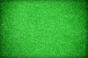 Green artificial grass texture background