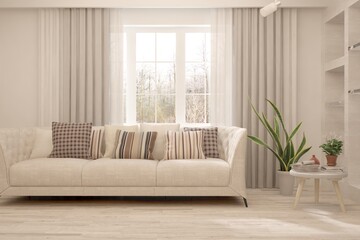 Modern living room in white color with sofa and winter landscape in window. Scandinavian interior design. 3D illustration