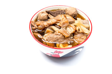 Soft stewed beef in a rich broth. Fragrant in a bowl. isolated on white background.