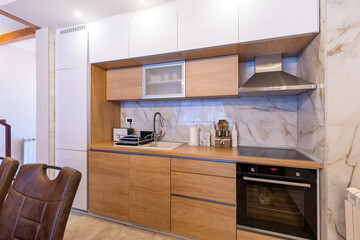 Kitchen interior in modern new mountain apartment