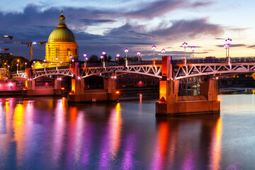 Toulouse Pont Saint-Pierre bridge with Garonne river at twilight in France