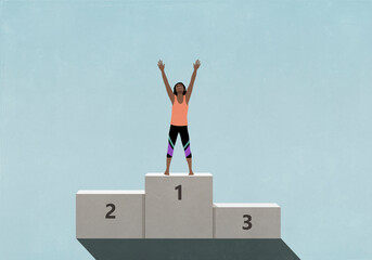 Victorious female athlete standing with arms raised, celebrating on 1st Place podium
