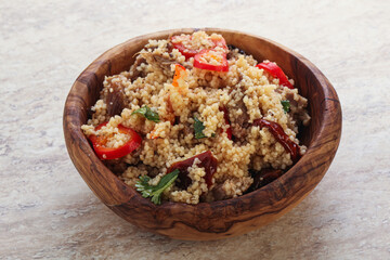 Arabic cous cous with meat and tomato