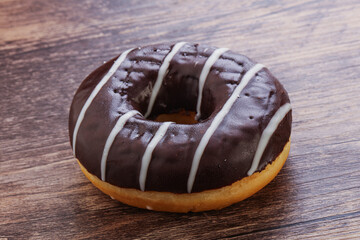 Glazed sweet tasty chocolate donut