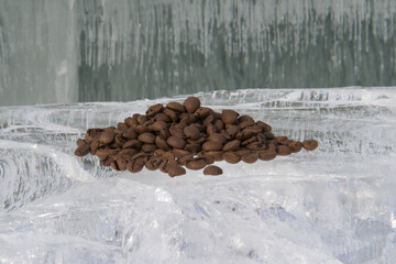 coffee beans on a piece of ice