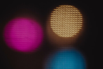 
the light is colored, the photo is defocused, bokeh
