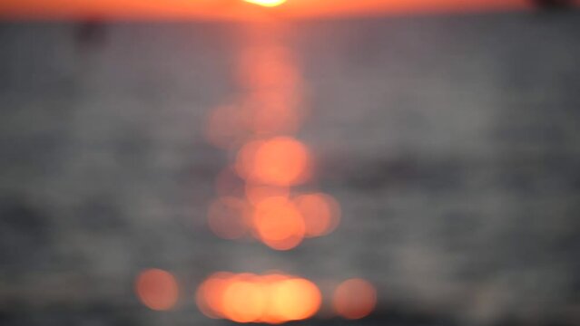 4k out of focus blur video of an amazing sunrise landscape at the Black Sea shore in Constanta, Romania, with beautiful orange sky color