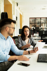 Colleagues arguing in office. Angry businesswpman yelling at her collegue..