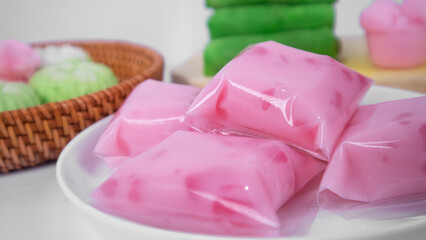 a plate of Cantik manis indonesian market munches