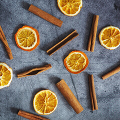 cinnamon sticks and dried orange, pattern, top view, spicy set for mulled wine