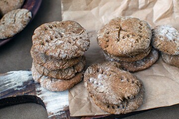 Bread cakes made of yeast-free dough on a wooden board close-up.Homemade cakes, cookies. bread cakes. We cook at home.
