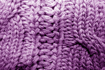 Warm knitting texture in purple tone.