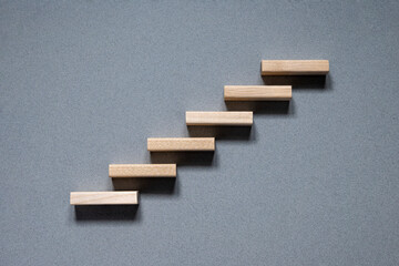 The wooden blocks are staggered from bottom to top in a diagram. Blank blocks to fill in information and create diagrams