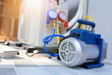 The vacuum pump is used to suck air out of the refrigerant piping system before charging the...