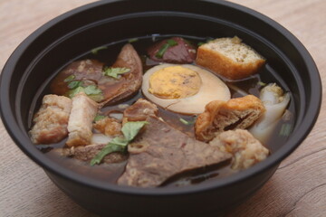 Rolled Rice Noodles in Five-spices Broth or Crunchy Pork Soup, what we call 