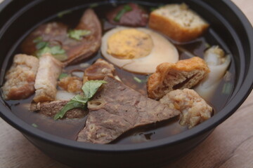 Rolled Rice Noodles in Five-spices Broth or Crunchy Pork Soup, what we call 