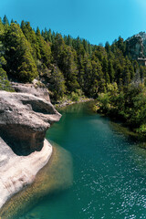 rock by the river