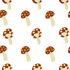 Cute doodle red mushroom seamless pattern on white background. Red, yellow and cream. 