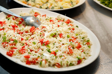 salad plate with grated cabbage, tomato and pepper