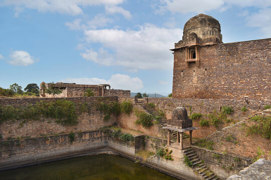 Stone stairway of Motia Talab, view of Badal Mahal on right, Pameya Temple left at Raisen Fort, Fort was built-in 11th Century AD, Madhya Pradesh, India.