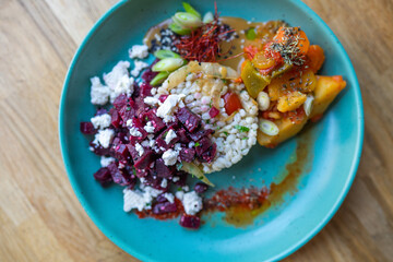 rice with vegetables and meat in a restaurant