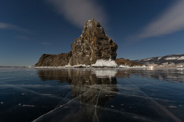 Reflection of the Oltrek island in the surface of the Baikal ice