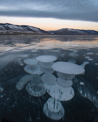 Methane bubbles in the surface of the Baikal ice
