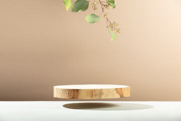 Flying Wood slice podium on beige background for cosmetic product mockup