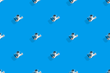 Seamless pattern from old cameras .Background on the theme of photography and photographic equipment. 