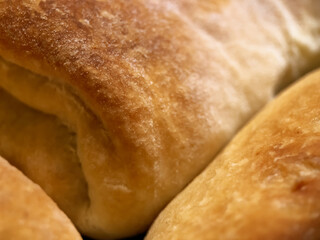 Selective focus close-up of freshly baked yeast, puff dough strudel. Pastries and bakery products