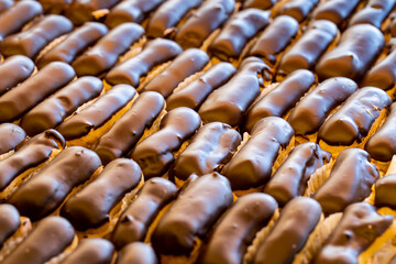 Close-up eclairs cake. Freshly made eclair cake in tray