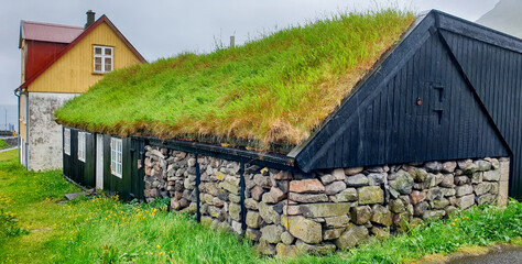 Green roof house in Gjogv village.island of Eysturoy. Faroe Islands.
