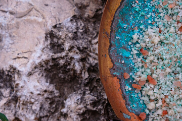 The cerulean color patina on the copper plate. Decorative effect. Oxidized copper plate with...