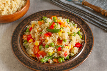 Healthy vegetarian dish made with quinoa and spring vegetables