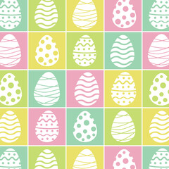 Easter eggs seamless pattern isolated on checkered squares in yellow,  lime green, pink and pale green. Great for postcards, greeting cards, advertising and posters 