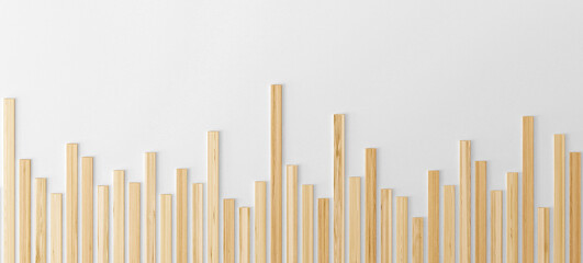 Business chart made of wood sticks on the wall