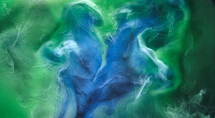 Blue green smoke on black ink background, colorful fog, abstract swirling ocean sea, acrylic paint pigment underwater © amixstudio