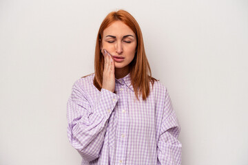 Fototapeta premium Young caucasian woman isolated on white background having a strong teeth pain, molar ache.