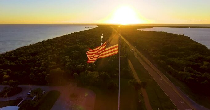 4K Drone Video of American Flag at Fort De Soto Park along Gulf of Mexico Beach near St. Petersburg, FL during Sunset