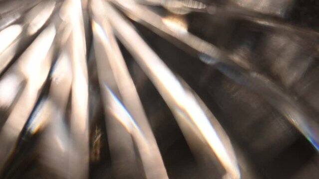 close-up of a beveled antique paperweight catching the light