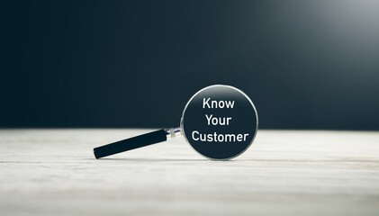 Magnifying glass with text Know your customer