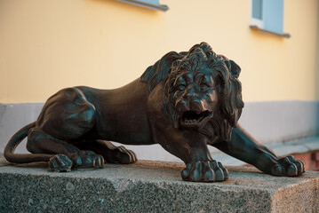 bronze and marble lion statue