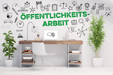 Schreibtisch mit Schriftzug Öffentlichkeitsarbeit