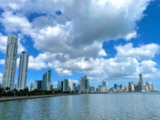 Fototapeta na wymiar Colorful panoramic view of Panama City with high skyscrapers and buildings on coastline, Panama