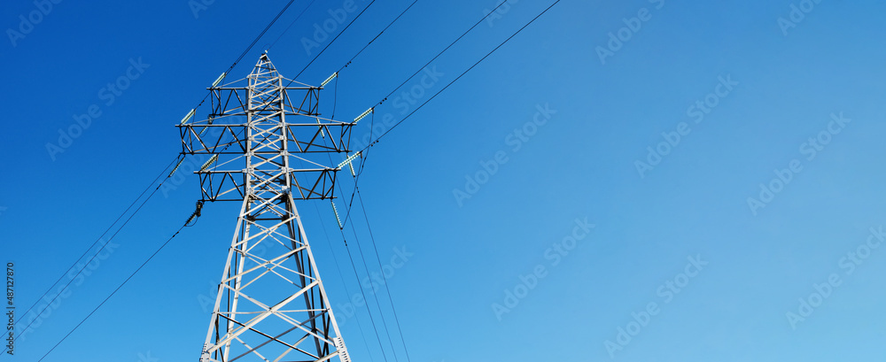 Wall mural high-voltage power lines over blue sky, high voltage electric transmission tower, panoramic layout