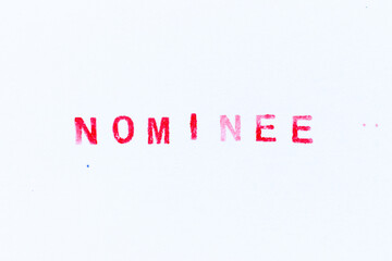 Red color ink rubber stamp in word nominee on white paper background